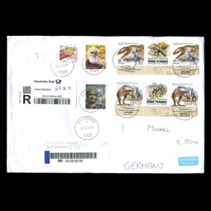 Stamp of Charles Darwin and stamp dinosaurs on registered letter from Serbia to Germany