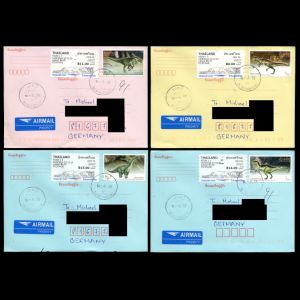 Dinosaur stamps from 1997 on used covers from Thailand